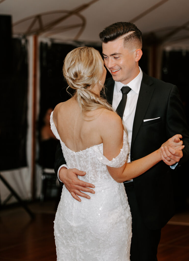 Bride and groom preform first dance during their fall wedding at The Willowdale Estate in Topsfield, Massachusetts.