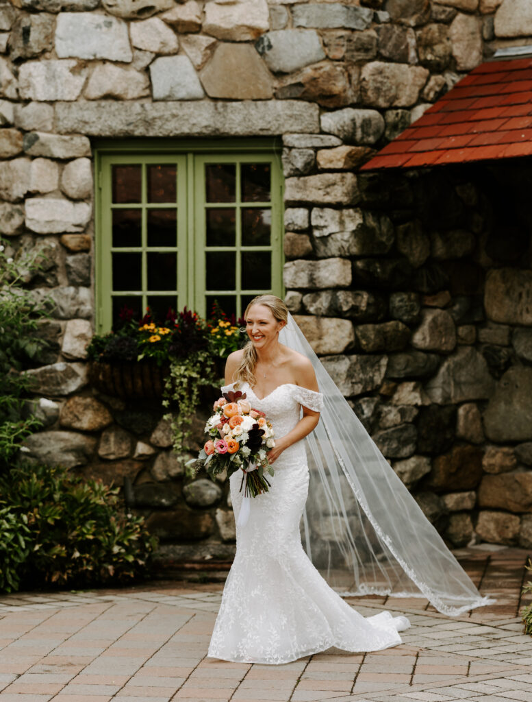 Bride sneaks up behind groom for first look at their wedding at The Willowdale Estate.