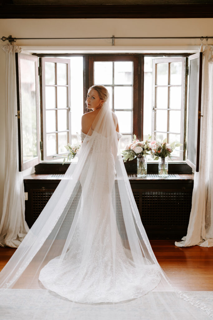 Pre ceremony bridal portraits in the bridal suite at The Willowdale Estate.