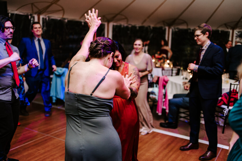 Bridesmaids dance during wedding reception at The Willowdale Estate.