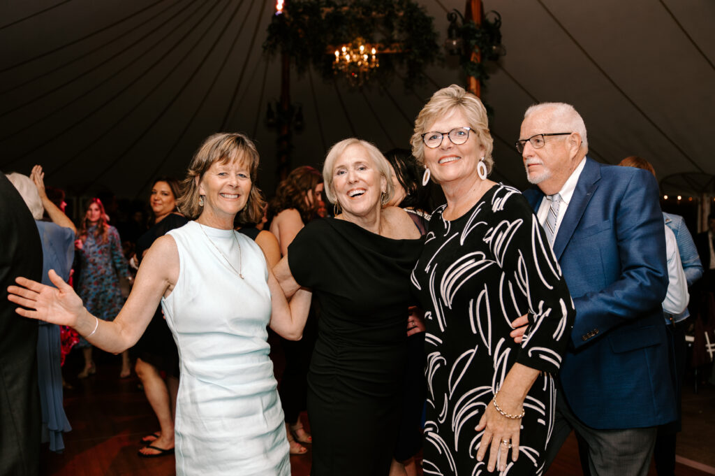 Guests dance during fall wedding at The Willowdale Estate.
