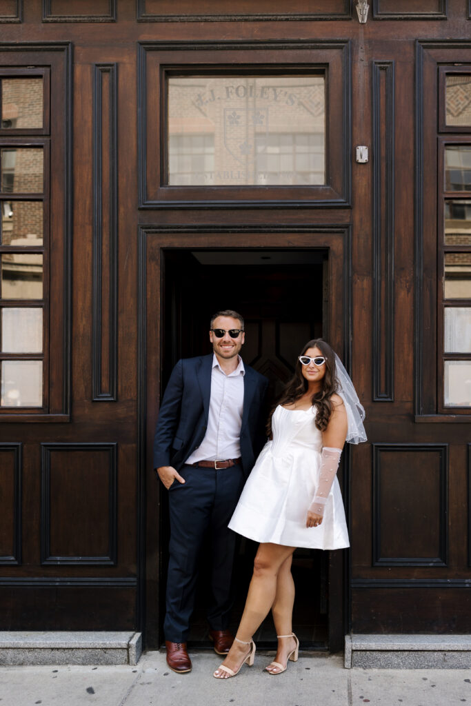 Romantic editorial engagement photos in a Boston bar