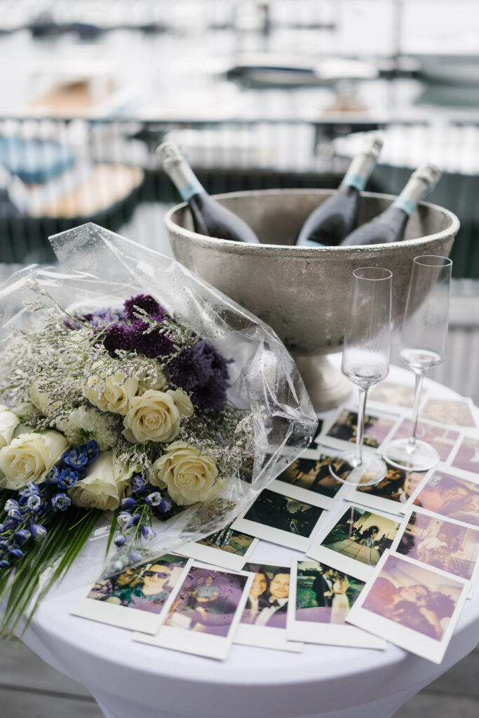 flowers and polaroids set up for surprise proposal