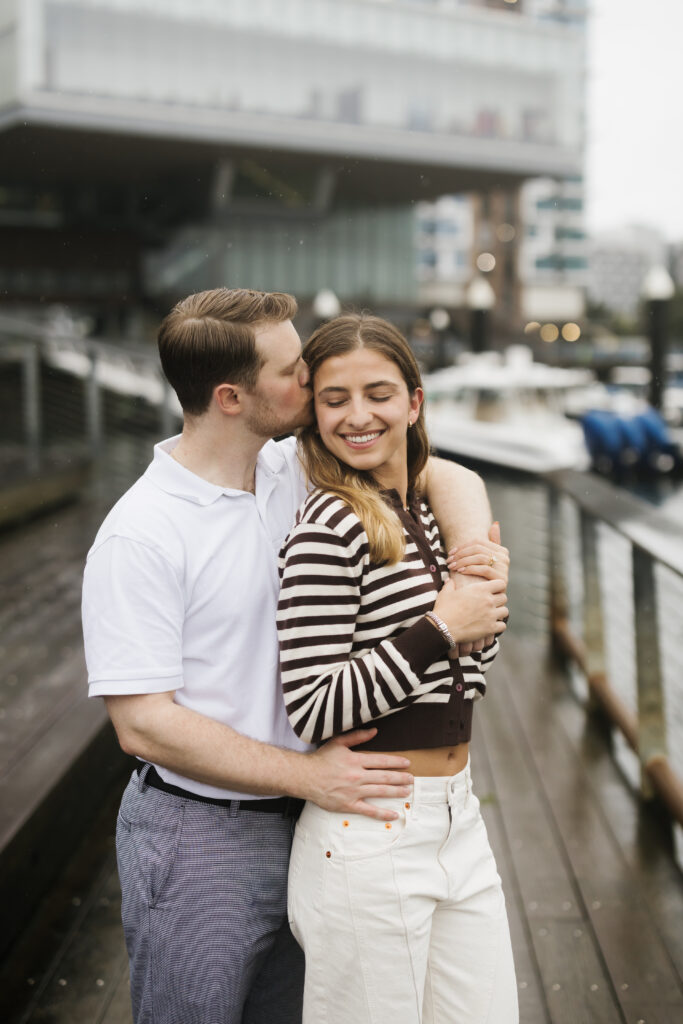 Engagement photos after surprise proposal in Boston Seaport. Boston wedding photographer