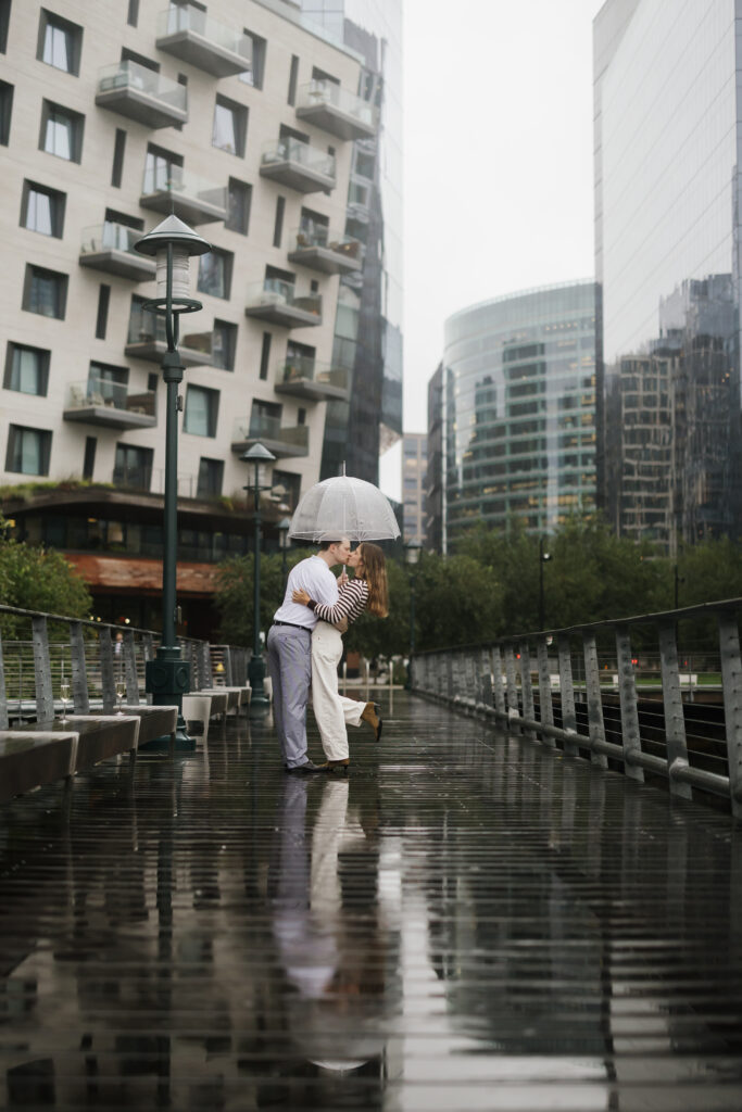 Engagement photos after surprise proposal in Boston Seaport. Boston wedding photographer