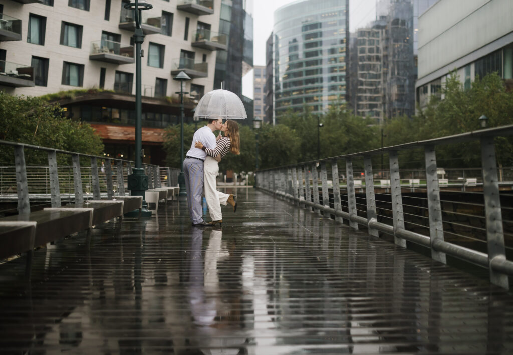 Engagement photos after surprise proposal in Boston Seaport. Boston wedding photographer