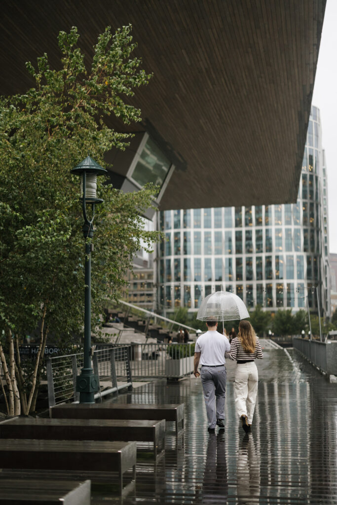 Engagement photos after surprise proposal in Boston Seaport. Boston wedding photographer