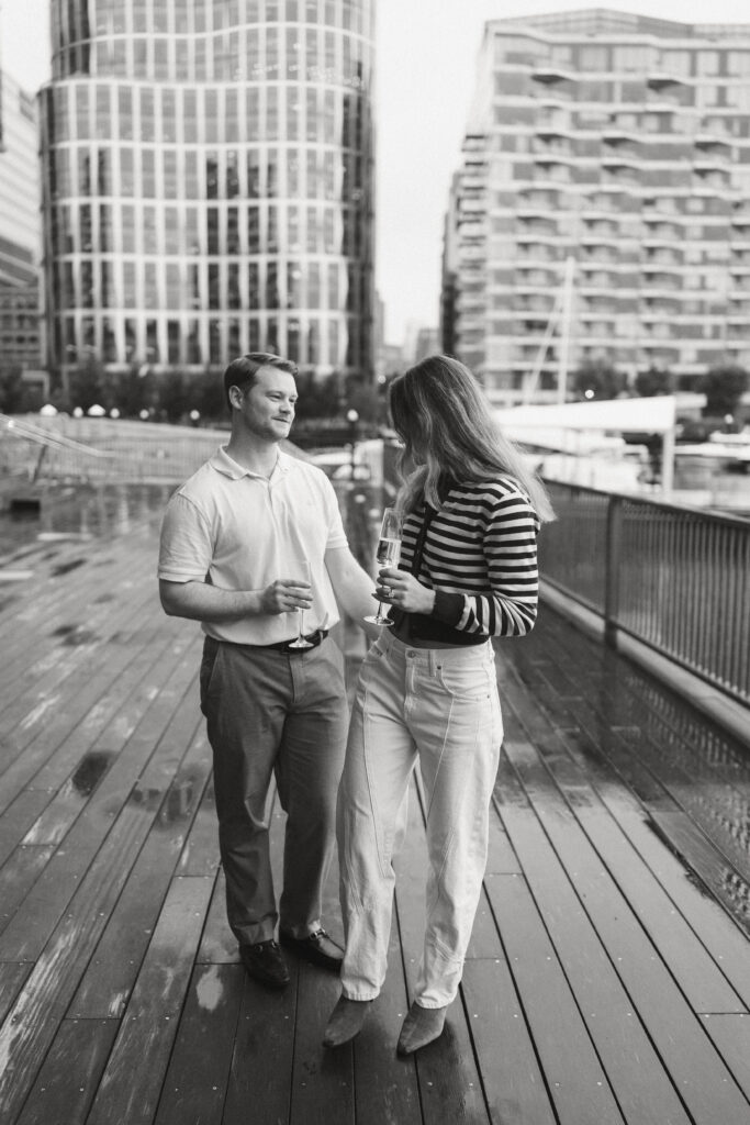 Engagement photos after surprise proposal in Boston Seaport. Boston wedding photographer