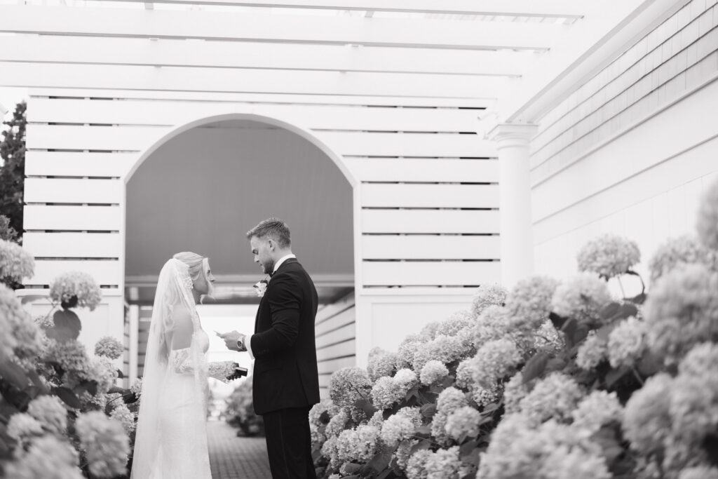 Bride and groom first look photos at The Dune at Wychmere Beach Club wedding venue
