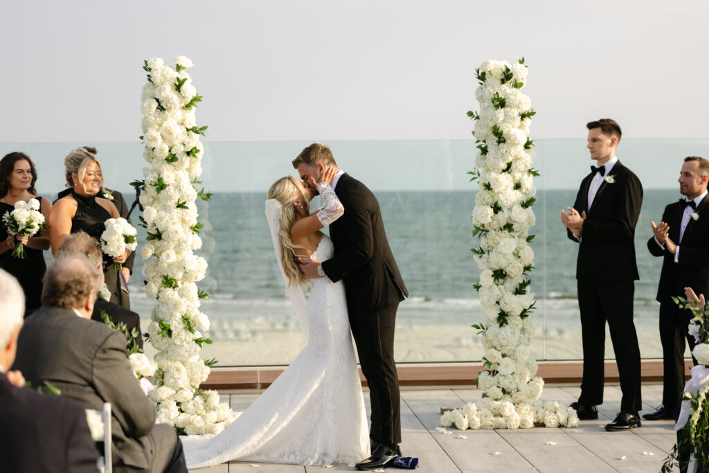 Wedding ceremony on rooftop terrace at wychmere beach club