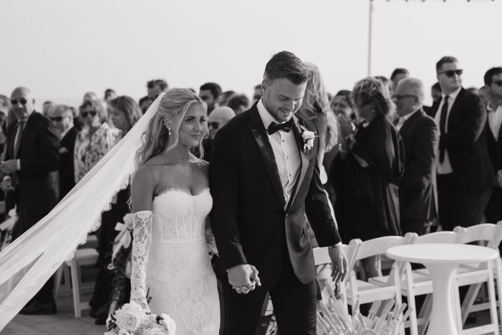 Wedding ceremony on rooftop terrace at wychmere beach club
