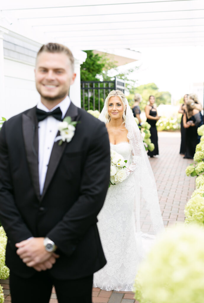 Bride and groom first look photos at The Dune at Wychmere Beach Club wedding venue