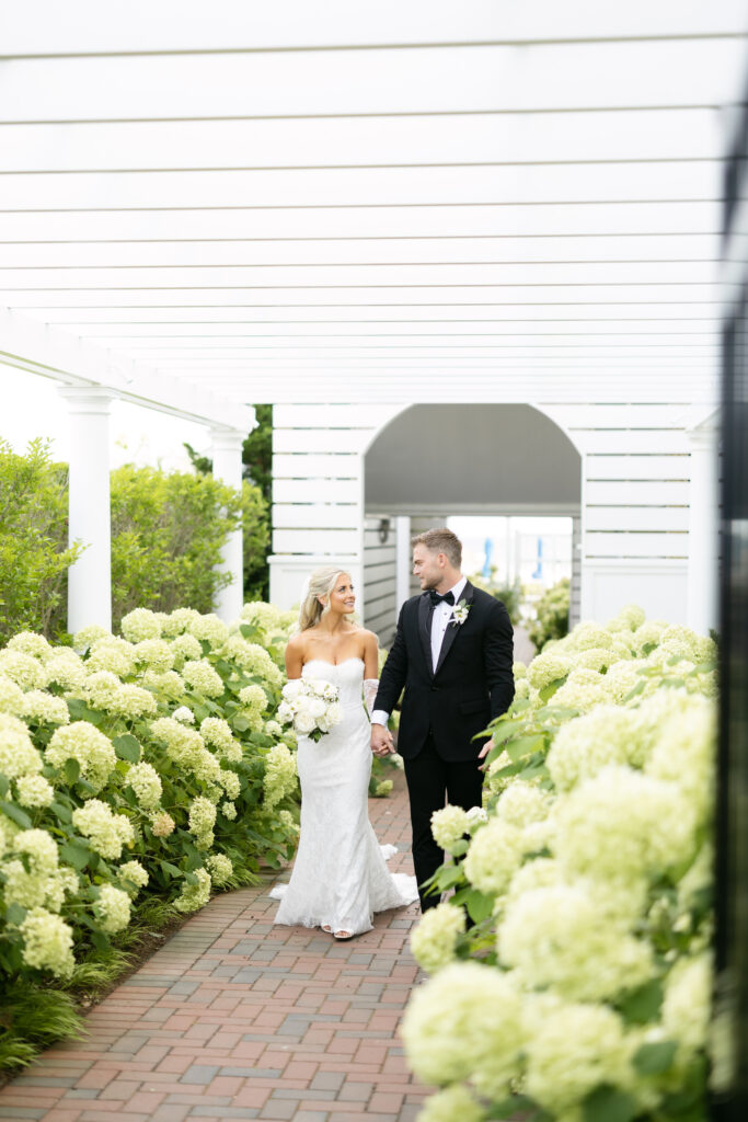 Bride and groom first look photos at The Dune at Wychmere Beach Club wedding venue