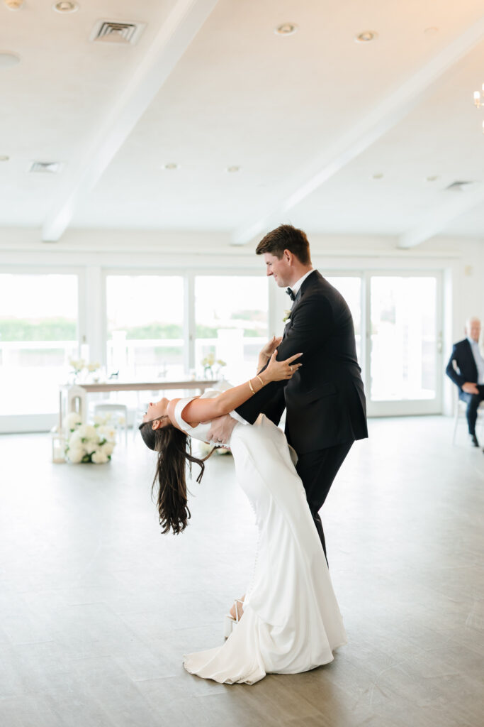 Wedding reception at The Ocean Room at Wychmere Beach Club wedding venue in Harwich Port, Cape Cod