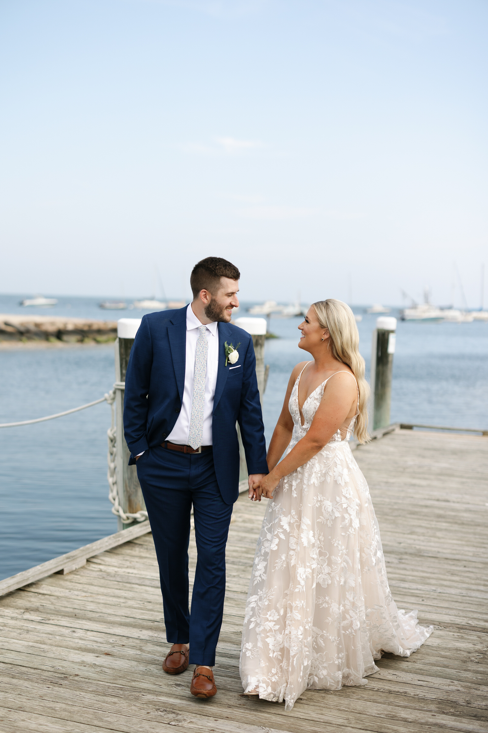 Bride and groom portraits at The Harbor Room wedding venue at Wychmere Beach Club on Cape Cod