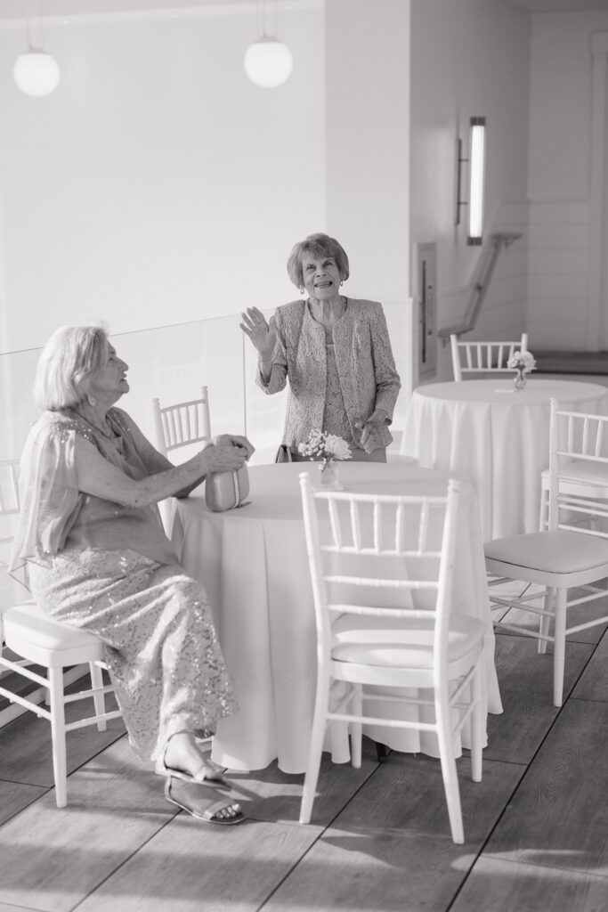 Candid in cocktail hour space at The Dune at Wychmere Beach Club wedding venue on Cape Cod