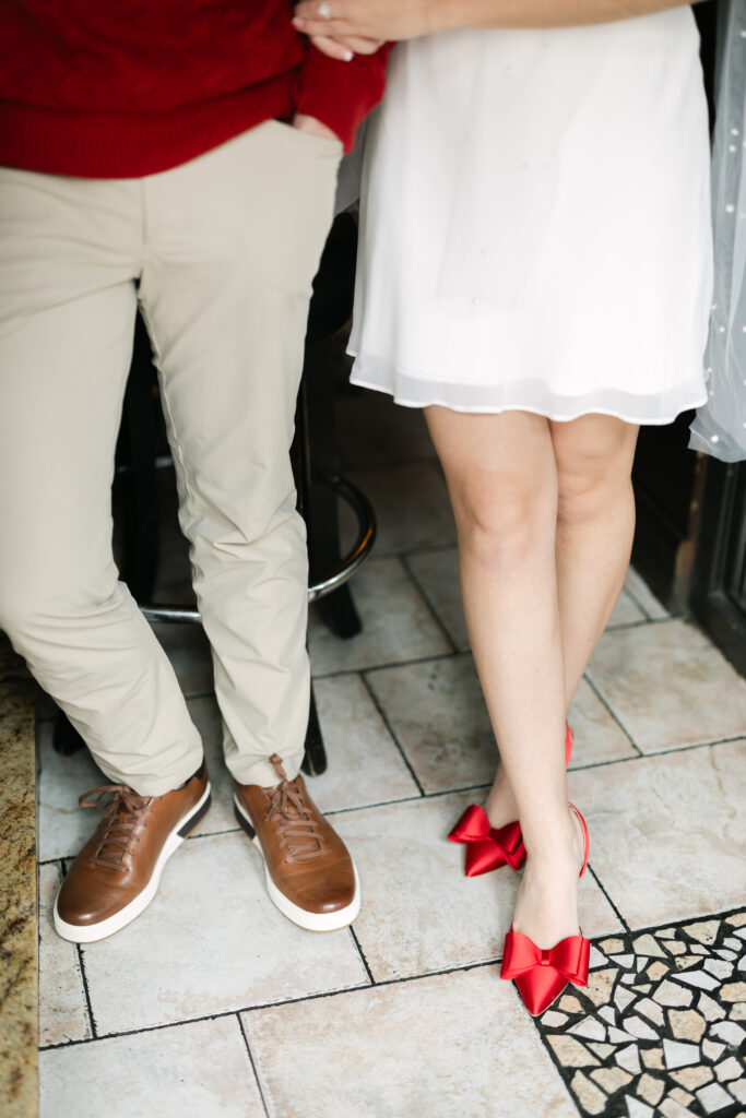 Bride and groom pants and white skirt, red shoes