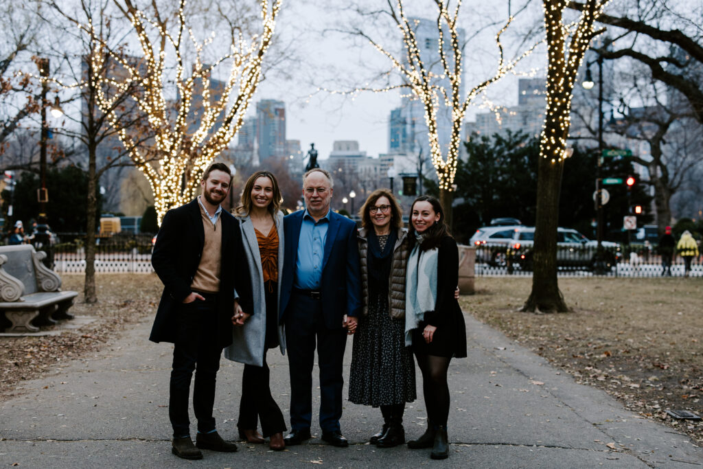 Family photo following a perfect Boston proposal in Boston, Massachusetts
