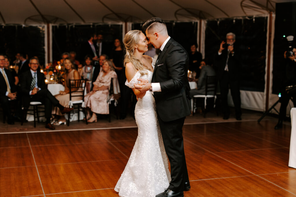 Bride and groom preform first dance during their fall wedding at The Willowdale Estate in Topsfield, Massachusetts.