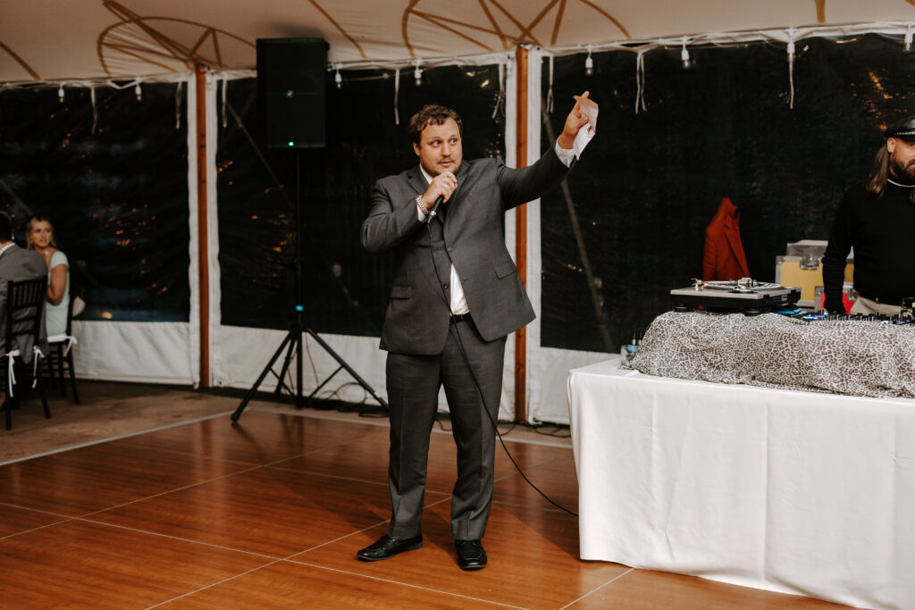 Best man gives speech at his best friend's wedding reception at The Willowdale Estate.