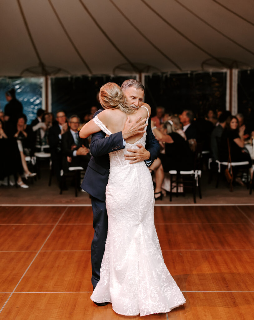 Bride and her father share a father daughter dance during wedding reception at The Willowdale Estate in Topsfield, Massachusetts.
