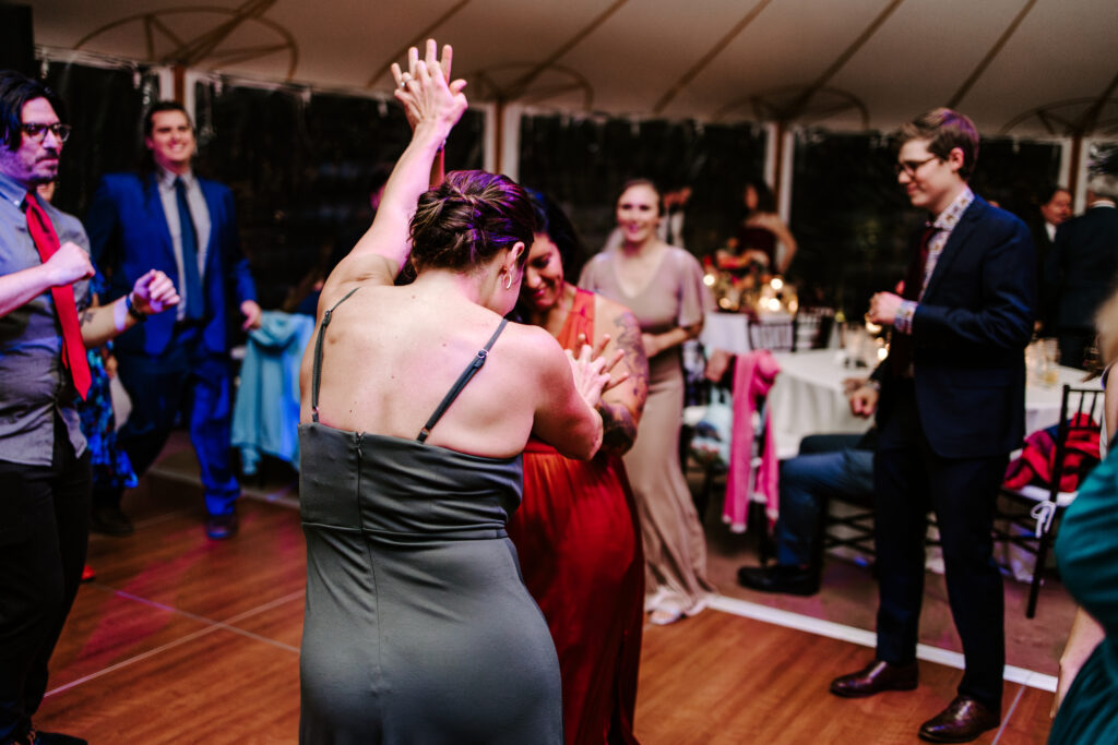 Bridesmaids dance during wedding reception at The Willowdale Estate.