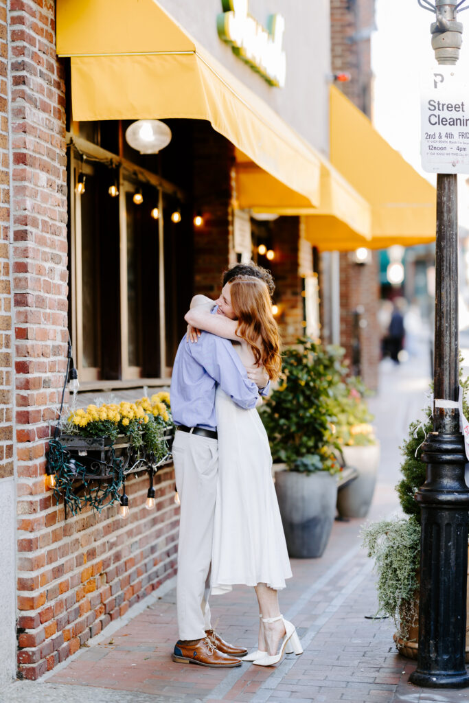 Couple hugs in north end boston photos