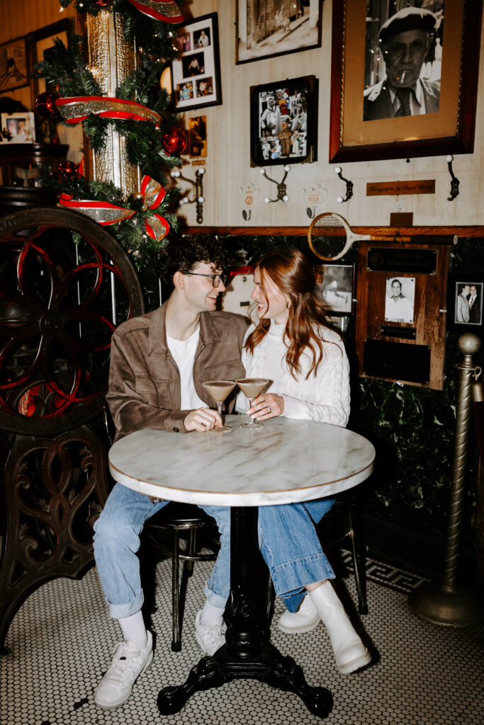 Boston engagement photos in a cozy cafe coffee shop with espresso martinis