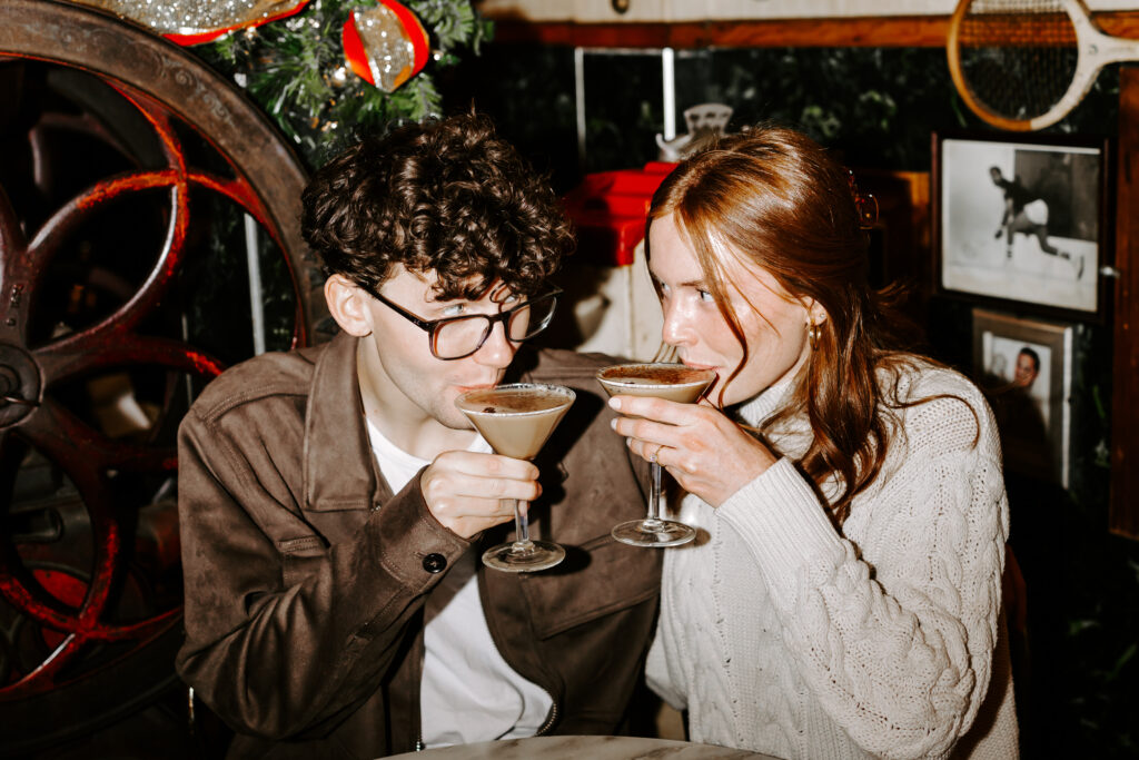 Boston engagement photos in a cozy cafe coffee shop with espresso martinis